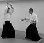 ATE � left palm on sword.