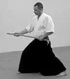 URA � noto, sword into belt.